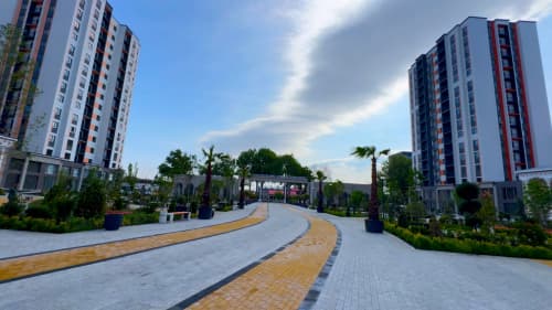 In Kokand’s “New Uzbekistan” residential area, landscaping and greening works are underway.