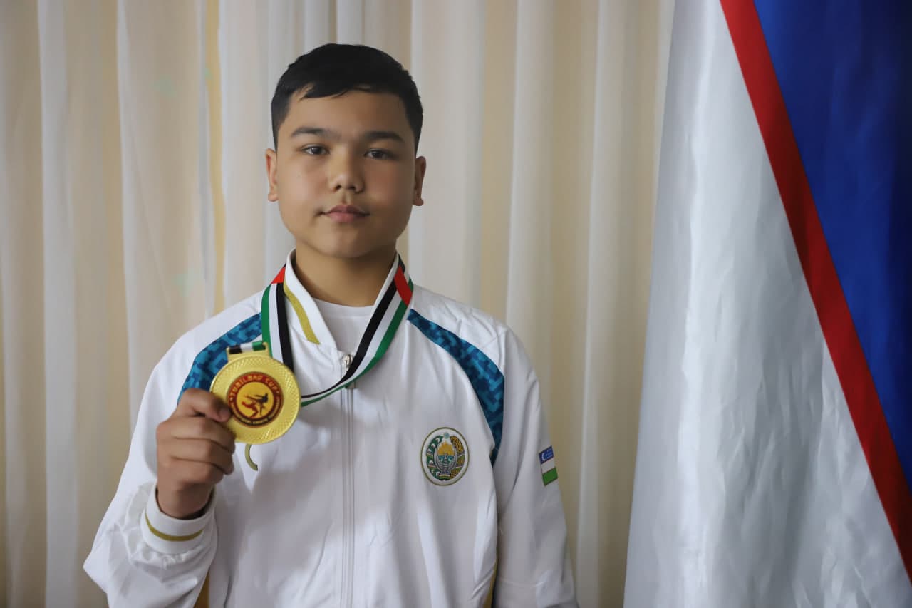 Таиланддаги халқаро мусобақада олтин медални қўлга киритган марғилонлик ёш спортчи М.Абдуллаев тантанали кутиб олинди