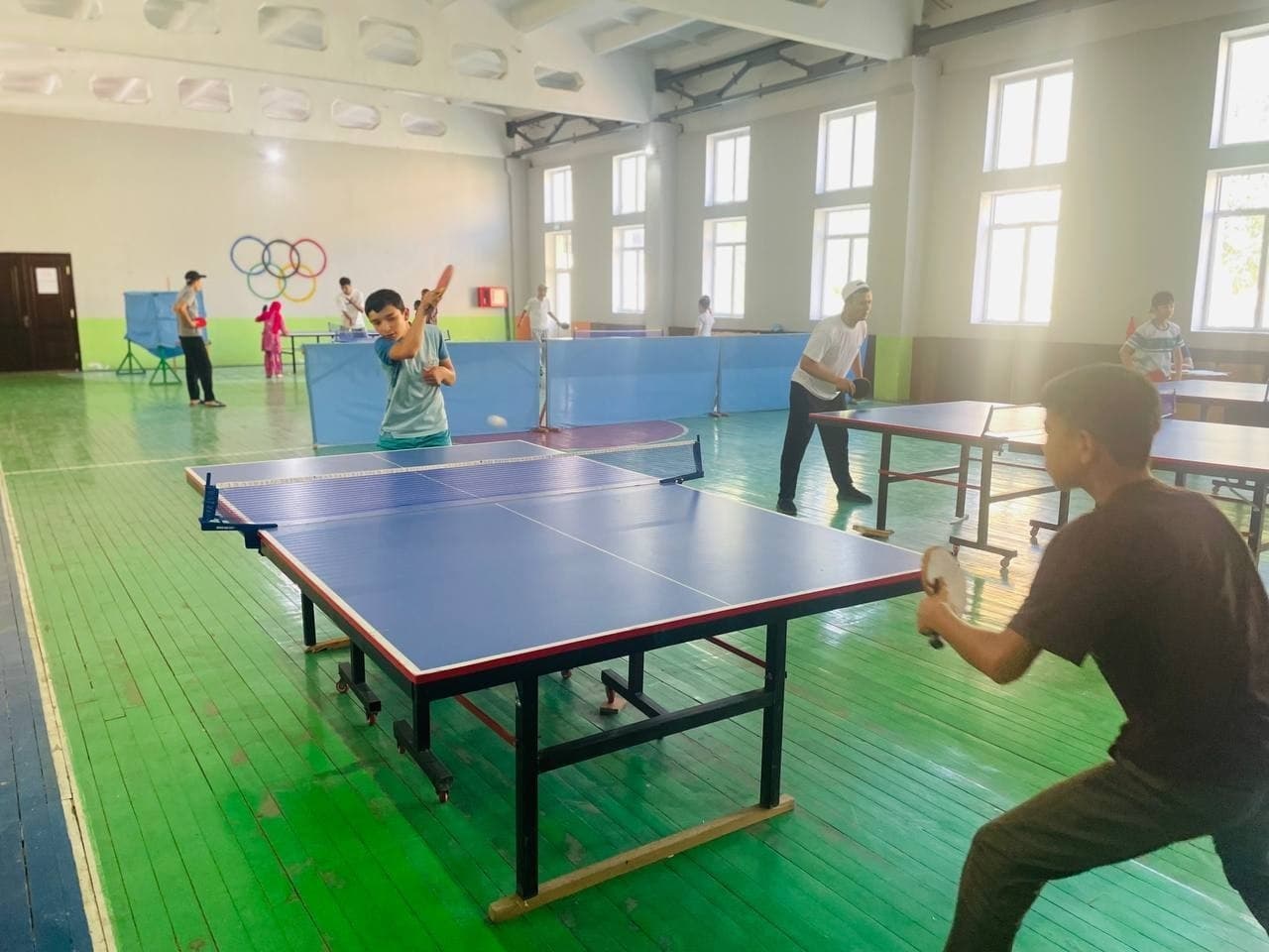 🏓 “Besh tashabbus” olimpiadasi doirasida stol tennisi bo‘yicha tuman bosqichi o‘tkazildi
