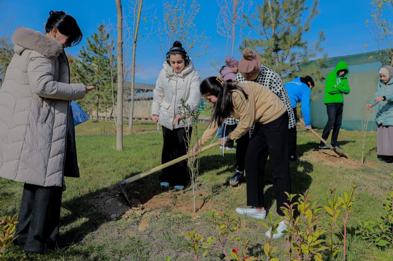 Young environmentalists plant trees at the park of Astronomy