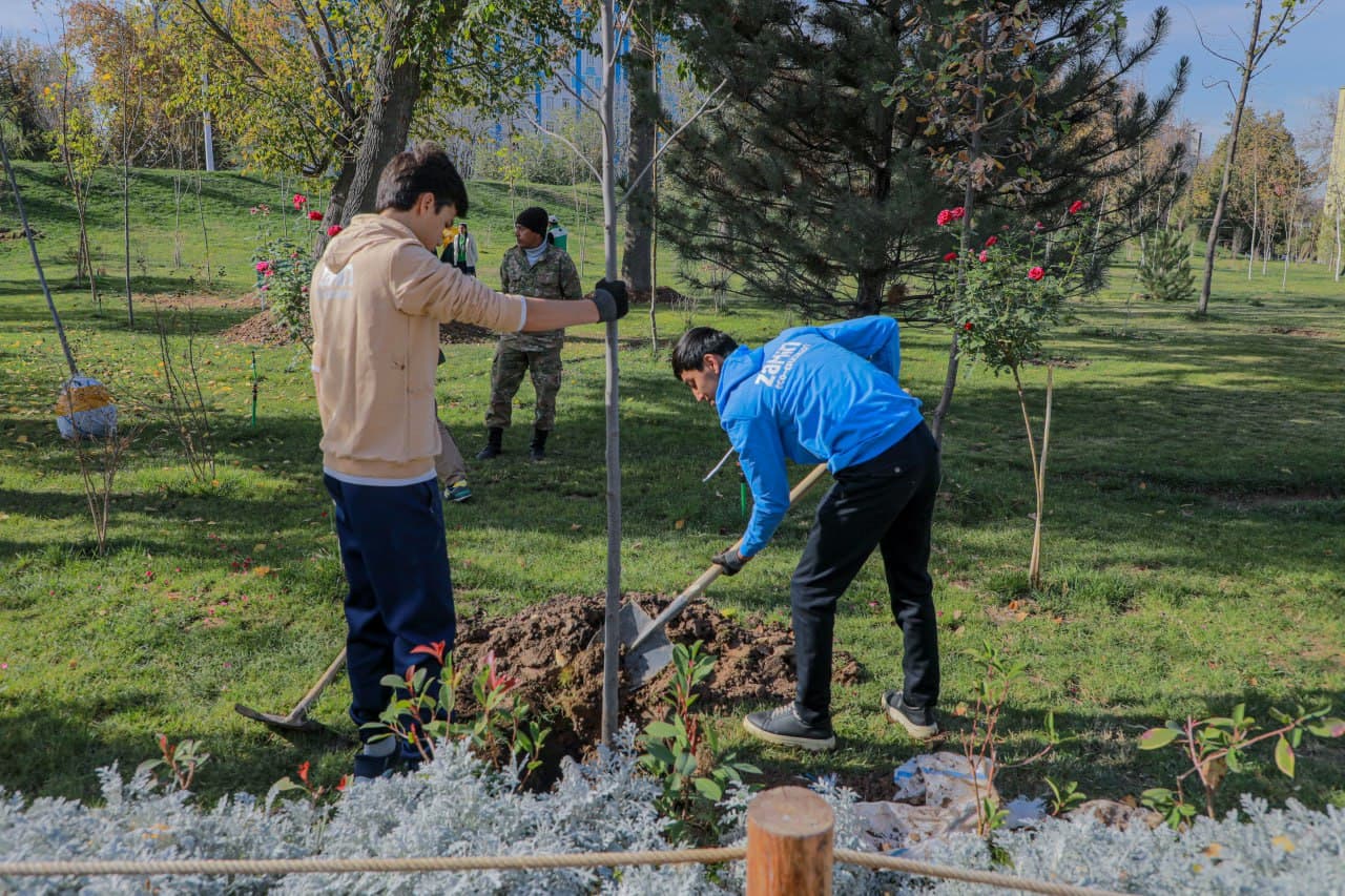 Young environmentalists plant trees at the park of Astronomy