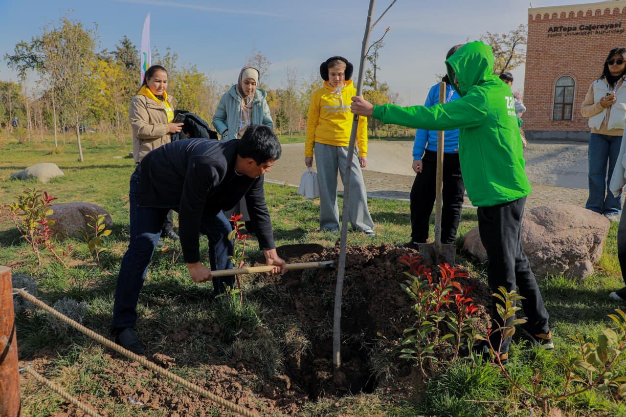 Young environmentalists plant trees at the park of Astronomy