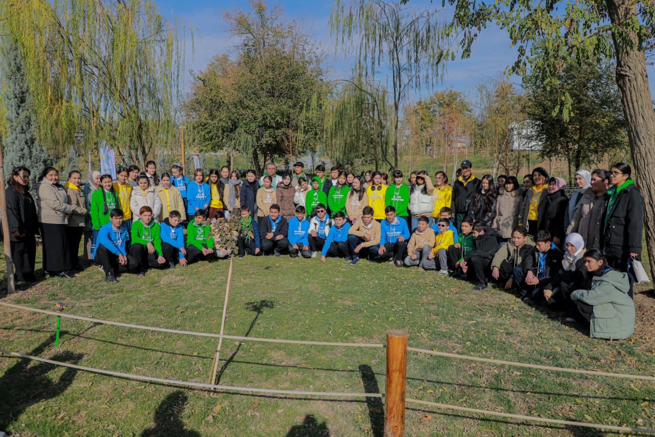 Young environmentalists plant trees at the park of Astronomy