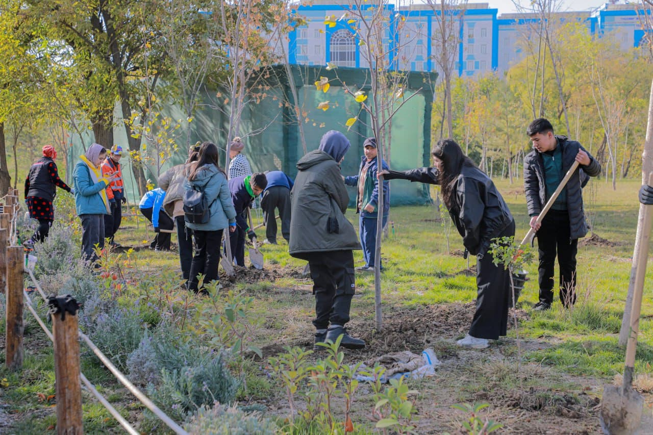 Young environmentalists plant trees at the park of Astronomy