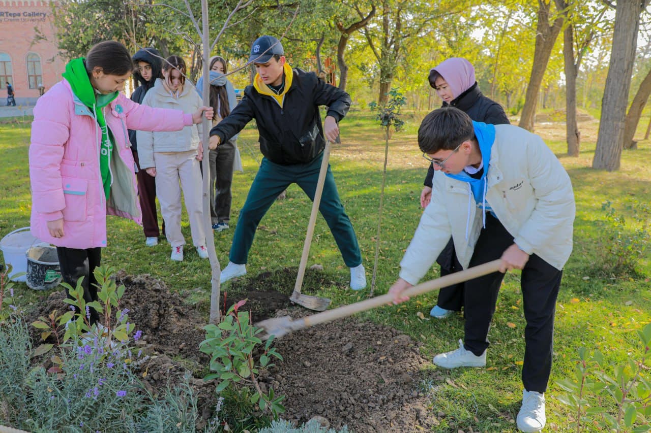 Young environmentalists plant trees at the park of Astronomy